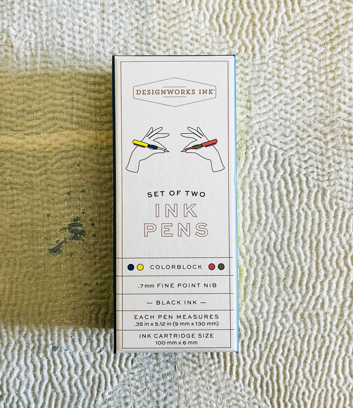 Designworks Ink pen package showing set of two colorblock pens on textured surface