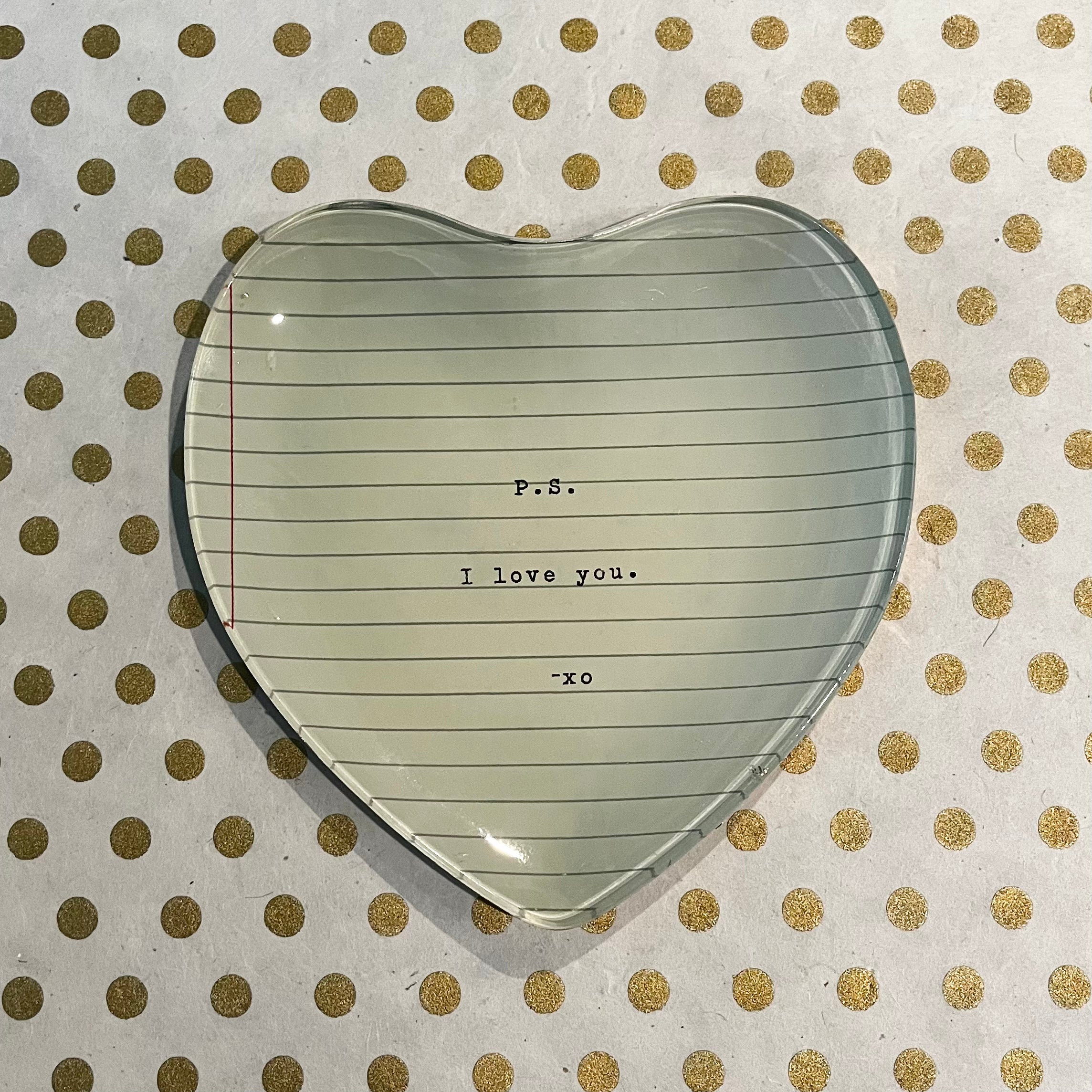 Heart-shaped glass tray with lined notebook design reading P.S. I love you -xo