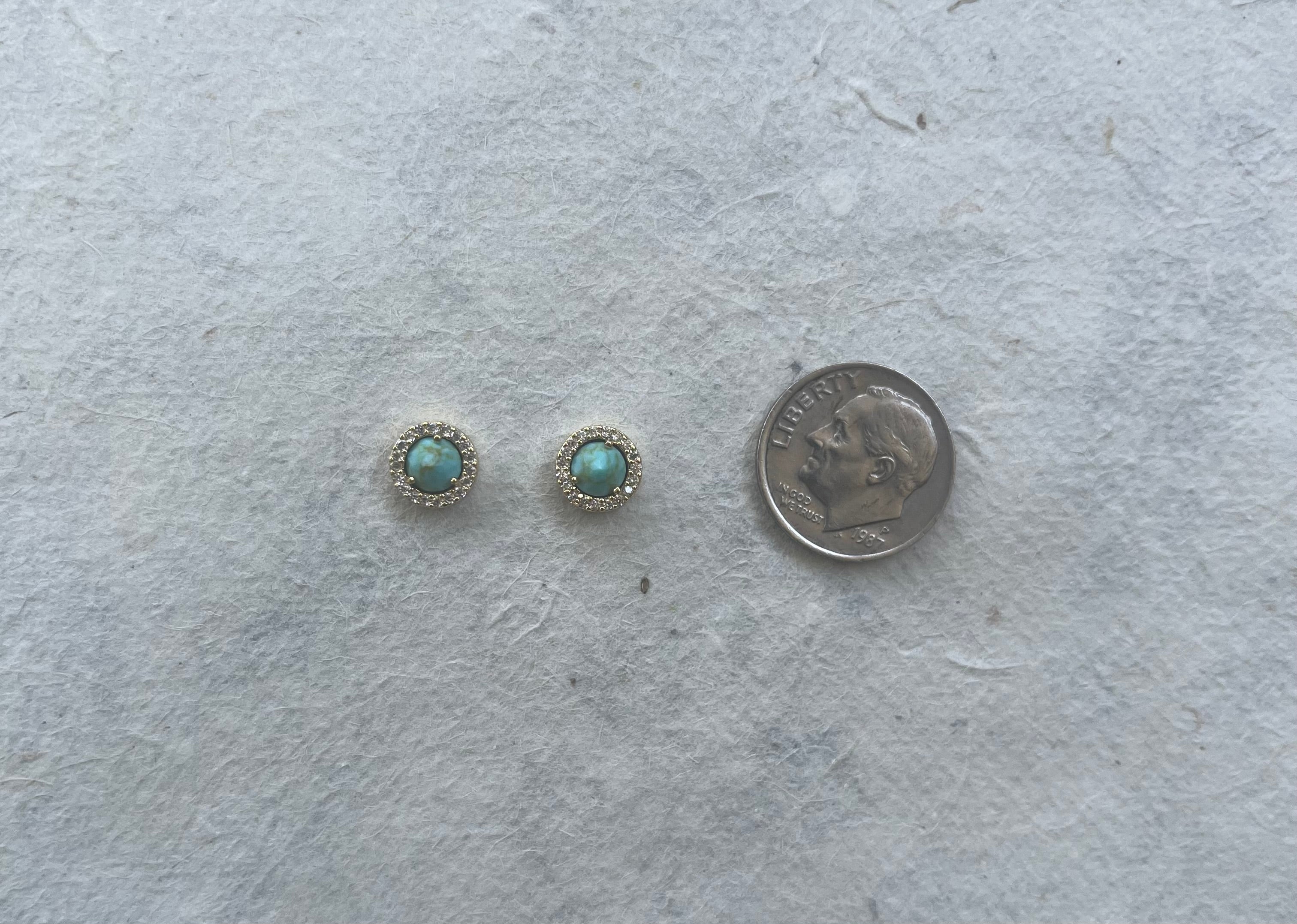 Two turquoise and CZ round stud earrings next to a dime for size comparison