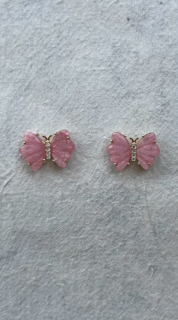 Pair of pink rose quartz butterfly stud earrings with crystal center detail