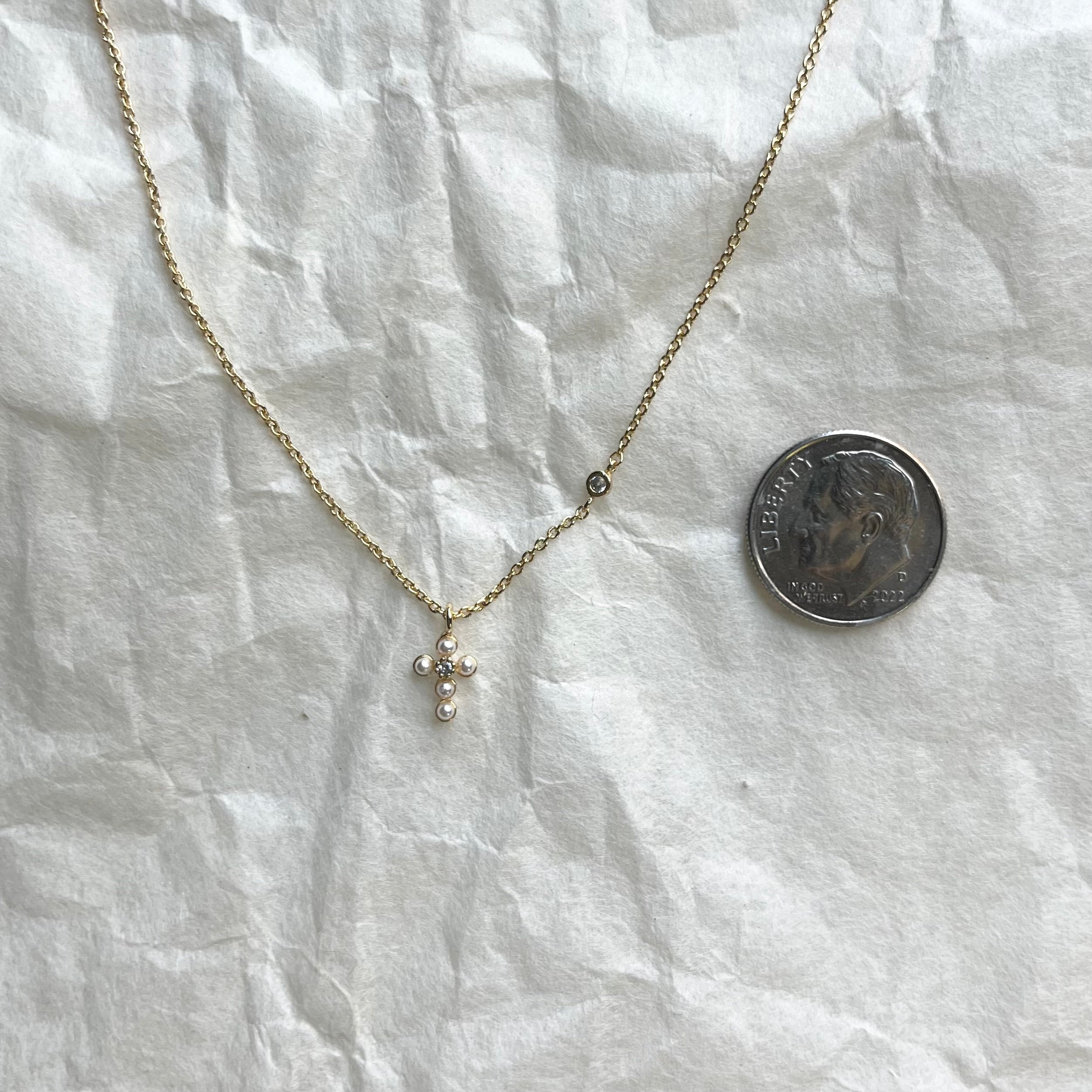 Precious pearl cross. necklace