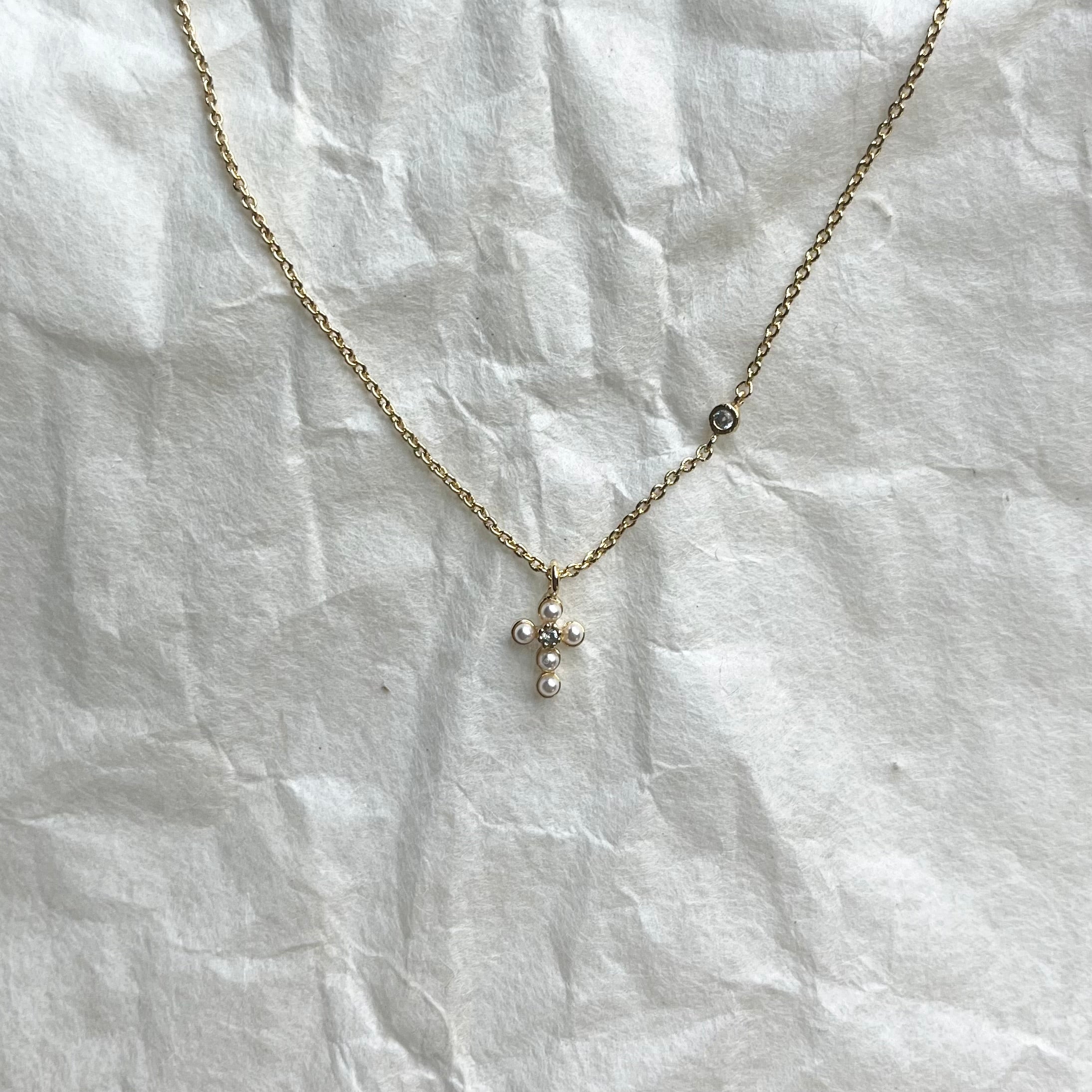 Precious pearl cross. necklace