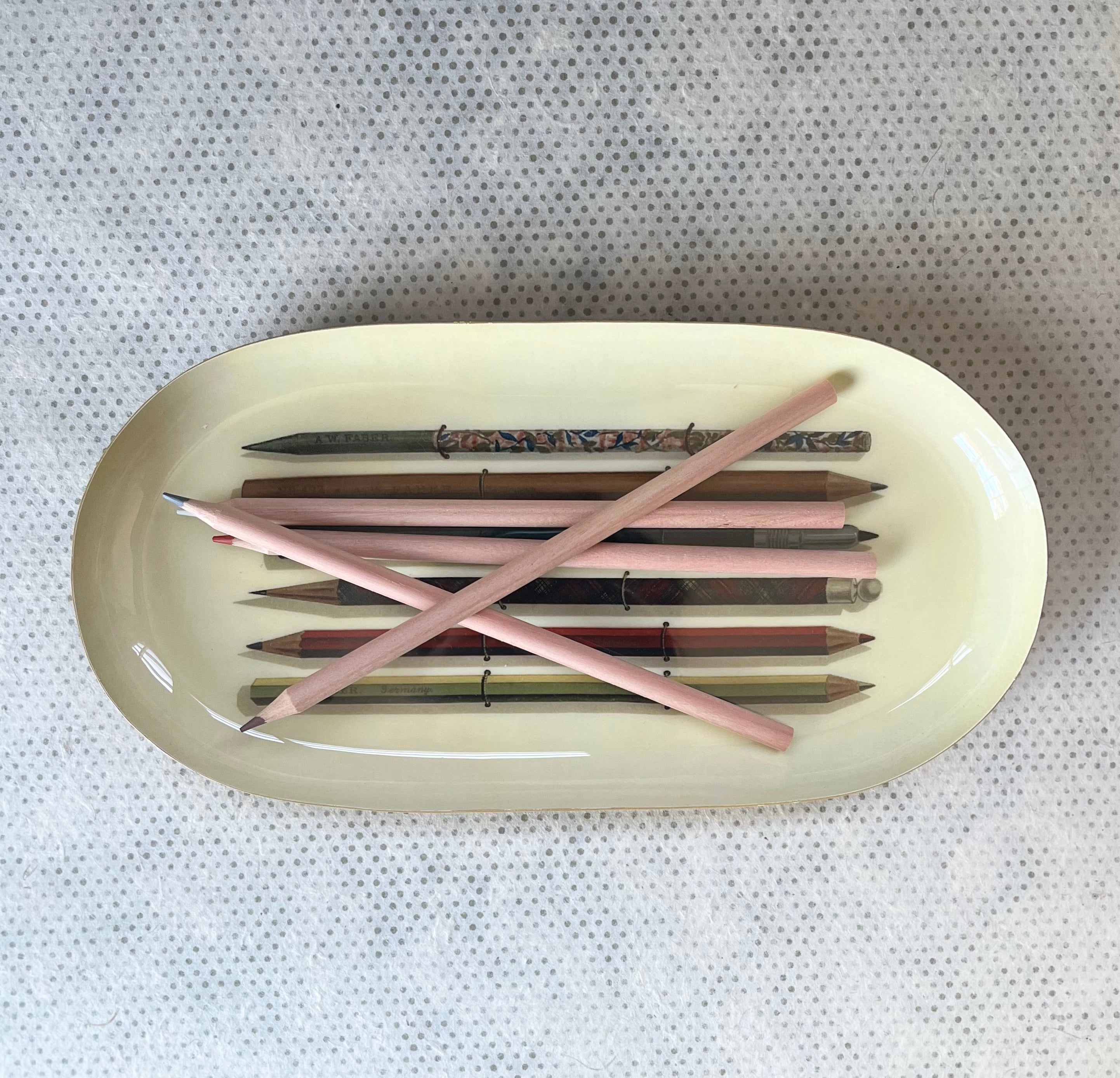 Enamel oval tray.  vintage pencils