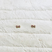 oh so tiny, but pack a punch.   earrings