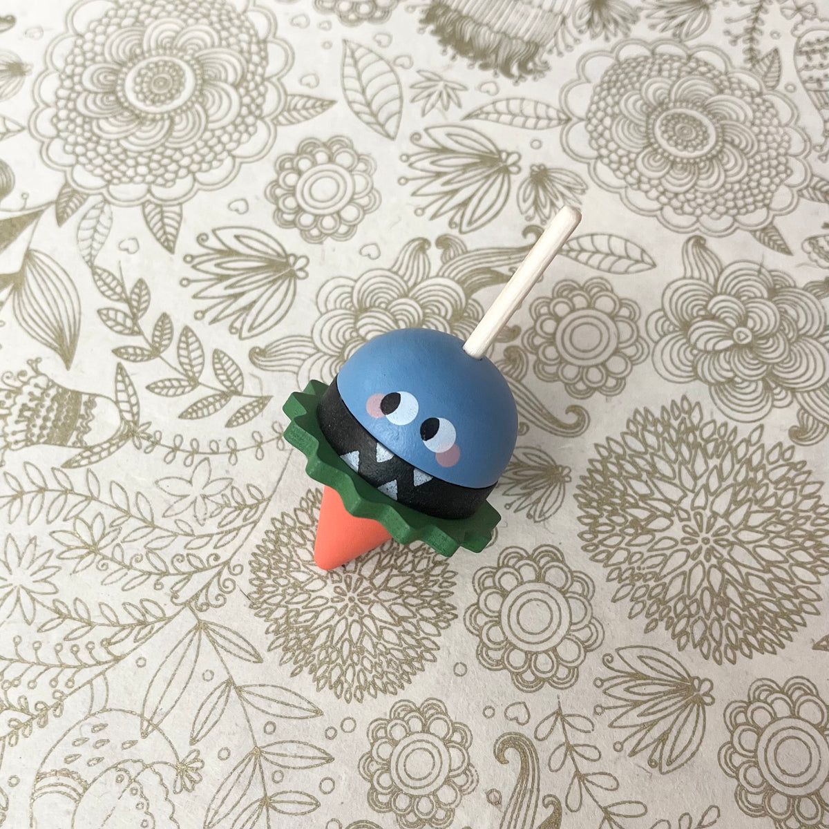 Dizzy monster spinning tops