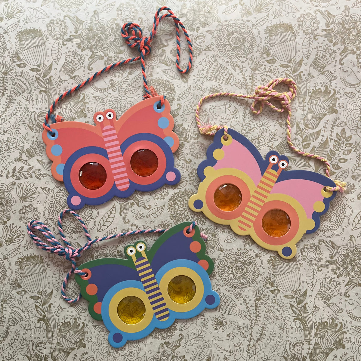 Butterfly prism lens