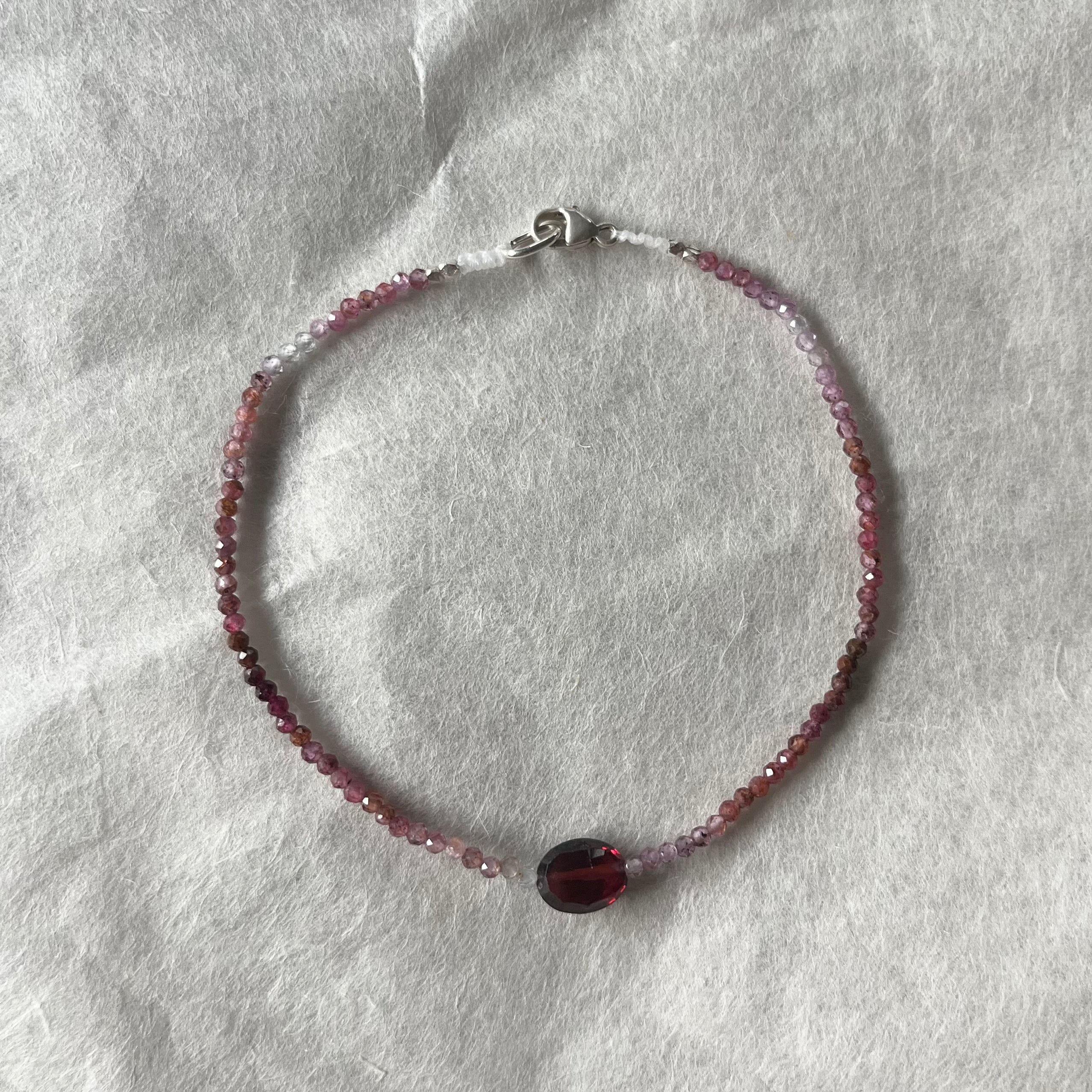 Sapphire Beads with a Garnet Center Bracelet